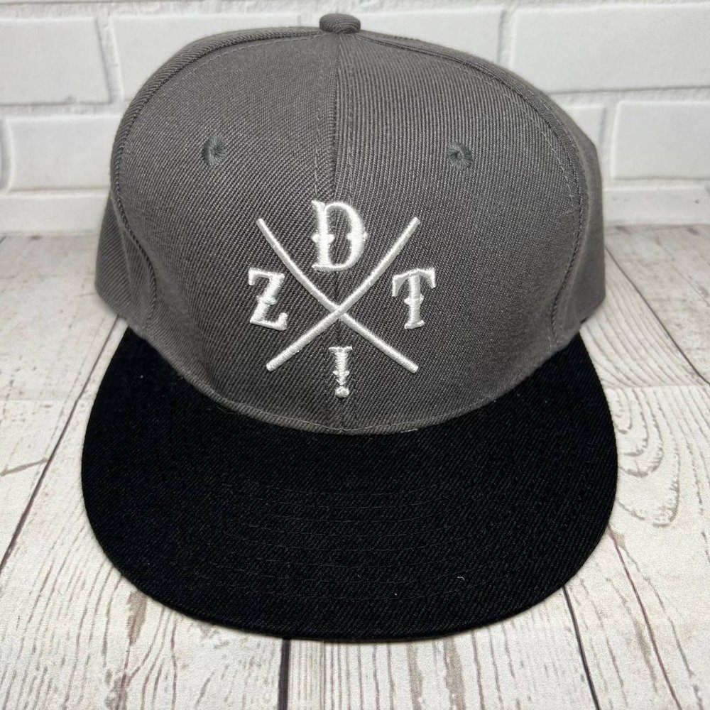 Gray and Black Snapback Cap with White Embroidered Cross Logo